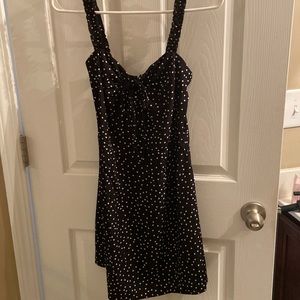 Black dress with white polka dots